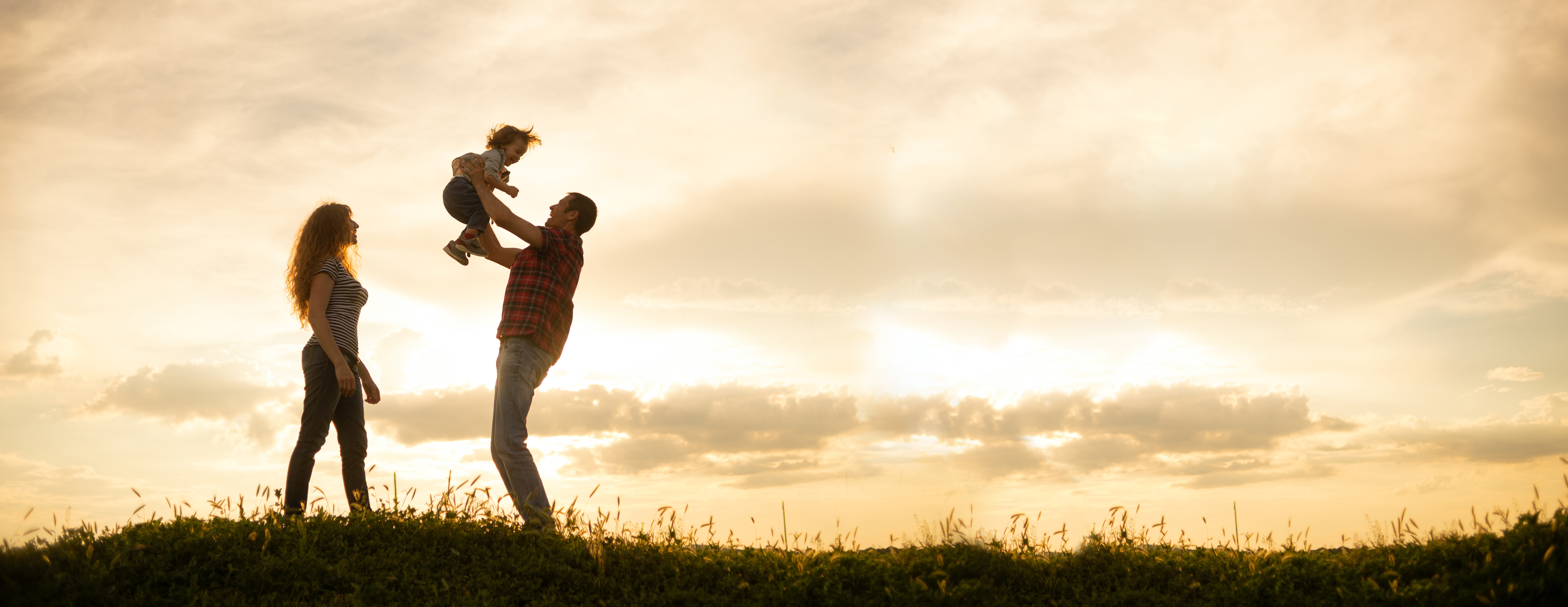 caucasian-family-mom-dad-little-son-sunset-silhouettes-parents-toddler-boy-background-sky-freedom-active-lifestyle