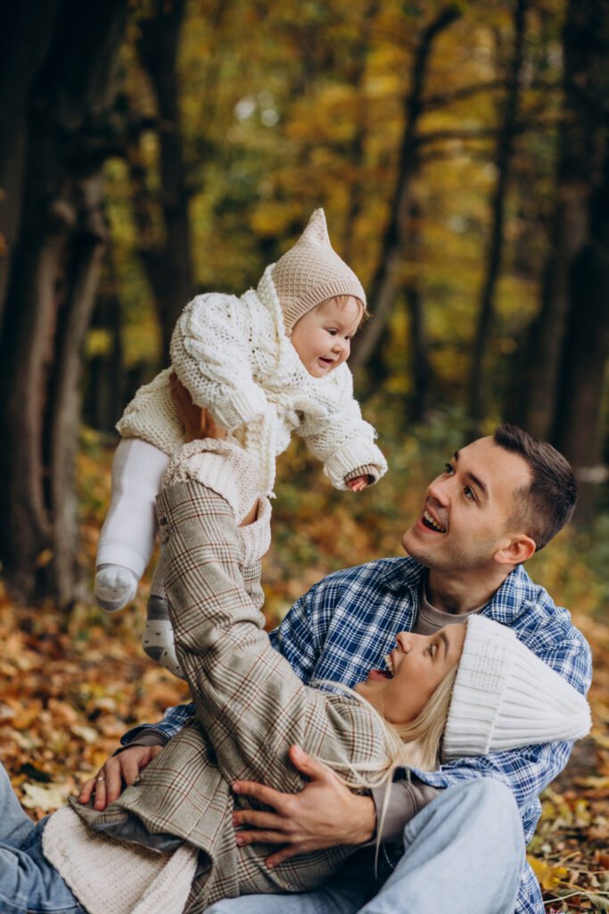 young-family-with-little-daughter-autumn-park
